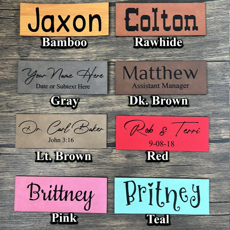 May include: Ten leather labels in different colors with names and text printed on them. The colors are bamboo, rawhide, gray, dark brown, light brown, red, pink, and teal.