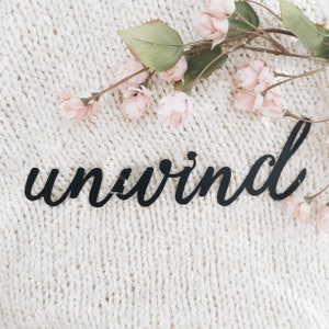 Unwind Metal Sign