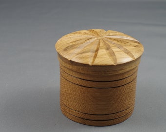 Hand turned  wooden box made from Oak into a jewellery / trinket box with a threaded fluted lid.
