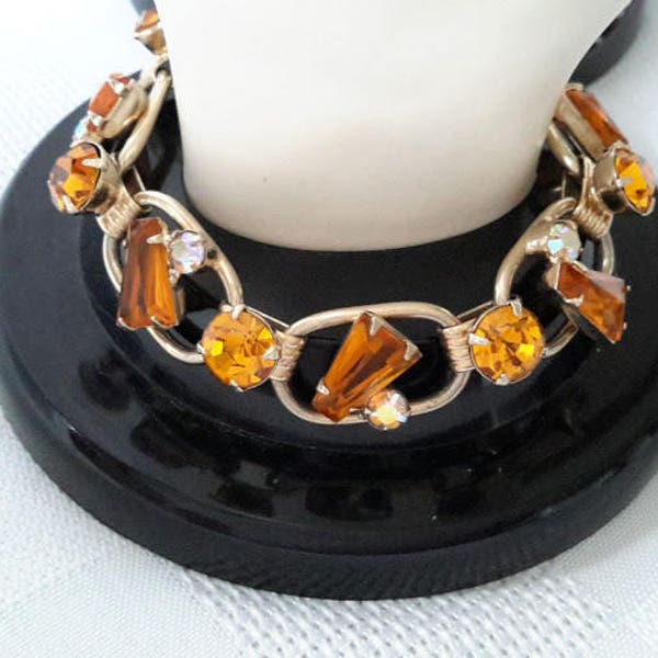 Five Link Bracelet, Amber Color Glass Keyhole Stones and Chaton Stones, Juliana DeLizza & Elster 1960-1970.