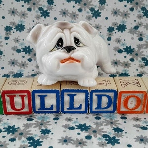 Vintage Made in Japan Ceramic Cartoon Figurine White Comical Sad Blue Eyes Bulldog