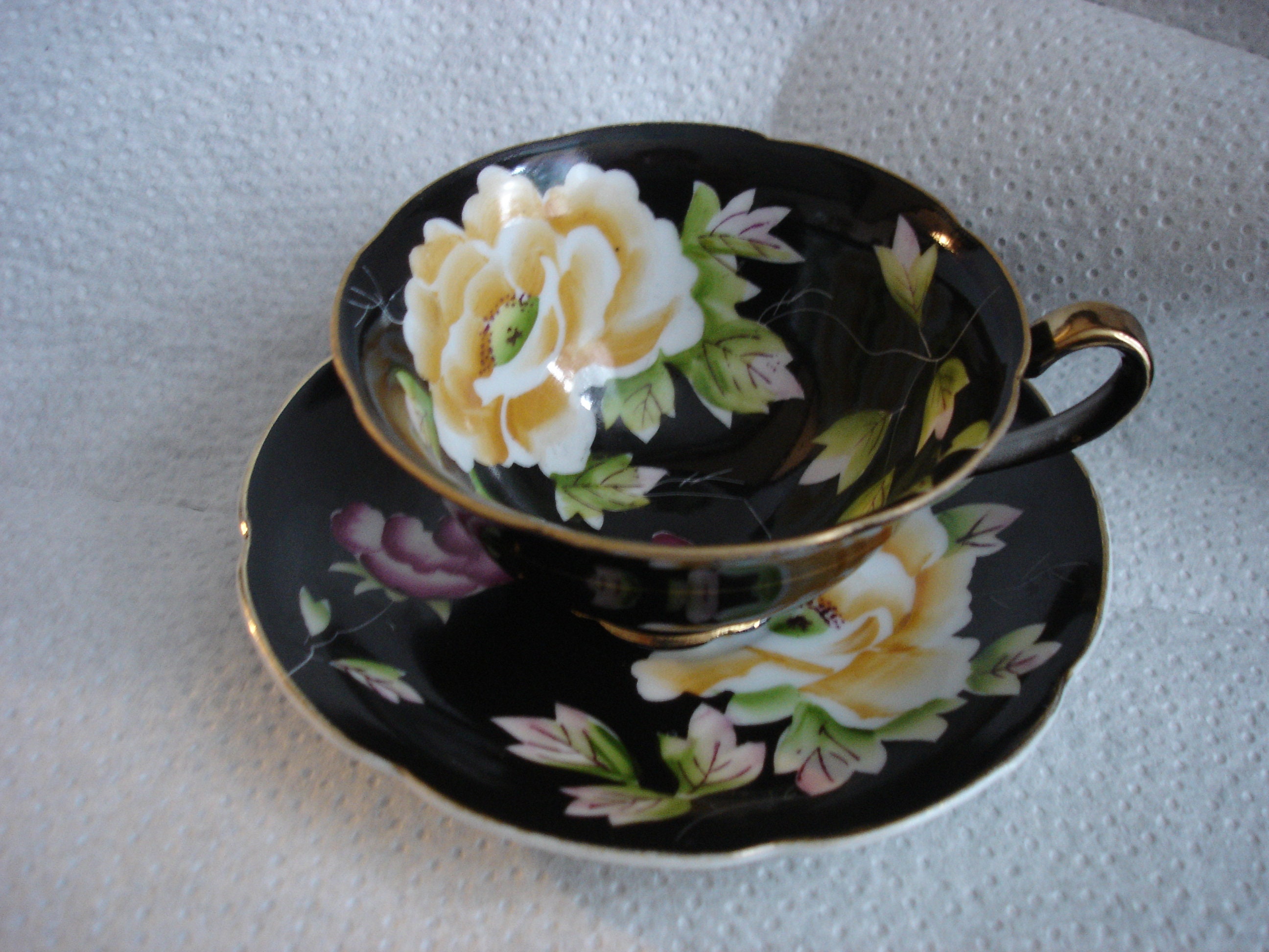Vintage Made in Occupied Japan Black Teacup and Saucer With Hand
