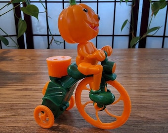 Anthropomorphic Jack-O-Lantern Halloween Character on Tricycle Wind-up Plastic Toy Made in China