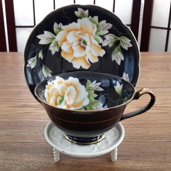 Vintage Made in Occupied Japan Black Teacup and Saucer With Hand