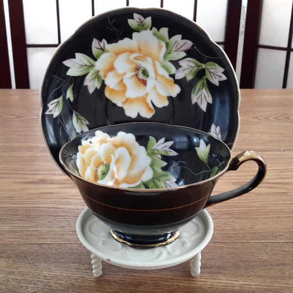 Vintage Occupied Japan Black Teacup and Saucer with Hand-Painted Orange Flowers