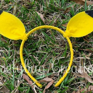 Pikachu inspired headband only. Tutu sold separately. Pikachu inspired costume