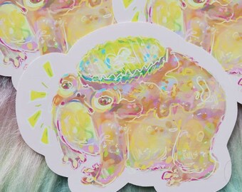Puede incluir: Tres pegatinas redondas con una rana de dibujos animados que lleva una corona amarilla y verde. La rana está dibujada en estilo acuarela con colores rosa, amarillo y verde.