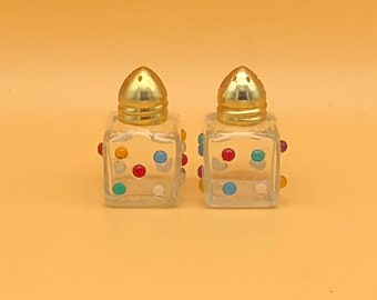 Vintage miniature 1960's era salt and pepper shakers...Clear glass with beads/gold tops...Disco era decor...Made in Taiwan R.O.C.