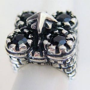 Castle Sterling Silver Ring with Black Stones