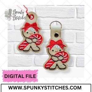 Archivo de bordado con llavero y tirador de cremallera en forma de lazo de jengibre de Spunky Stitches