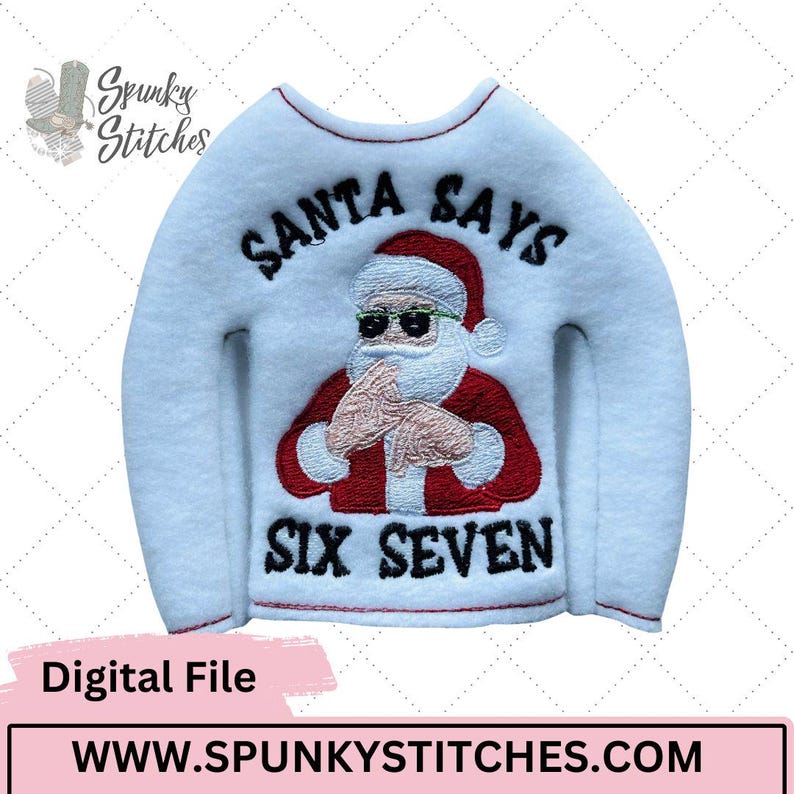 Pode incluir: Camisola de Natal branca com um desenho bordado do Pai Natal. O desenho apresenta o Pai Natal a usar &oacute;culos de sol e o texto "SANTA SAYS SIX SEVEN". A camisola &eacute; um ficheiro digital.