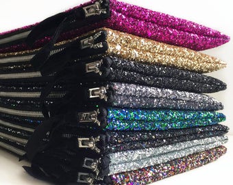 pink glitter clutch bag