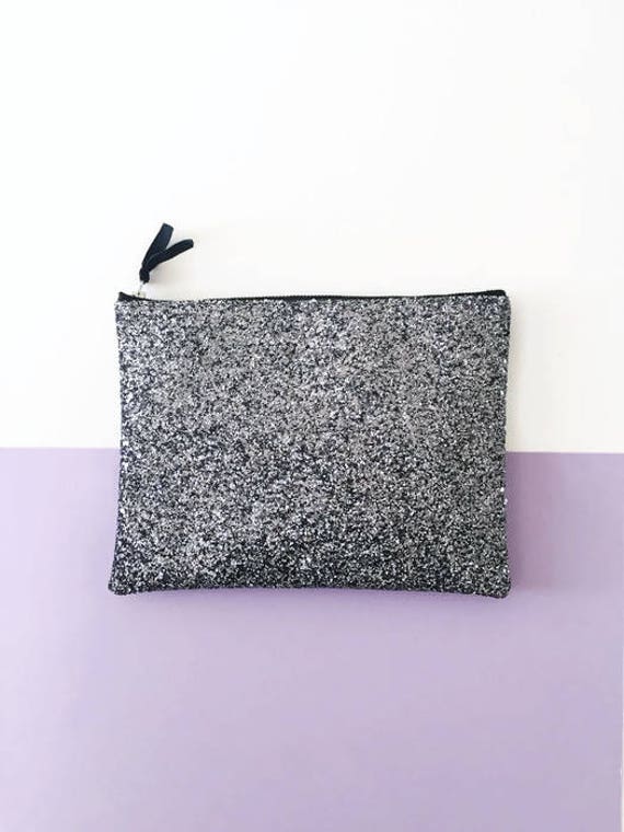 grey sparkly clutch bag
