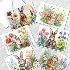 May include: A collection of watercolor Easter greeting cards featuring bunnies in a garden setting. Each card showcases a different bunny with floral arrangements, baskets of eggs, and colorful blooms. The cards have a soft, pastel color palette.