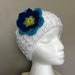 Sandy Wilson reviewed White Crochet Headband with Flower, Flowered Headband, Trendy Headband with Blue Flower, Back to School Wear, Handmade Headband for Her