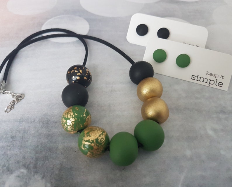 gold and green statement necklace