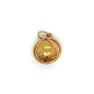 Vintage 18k yellow gold spinning globe charm pendant