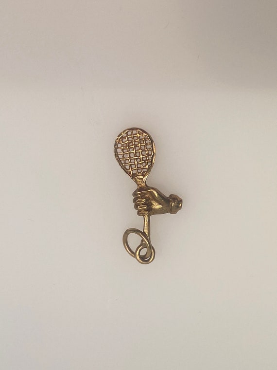 Vintage 14k yellow gold racket with hand holding c