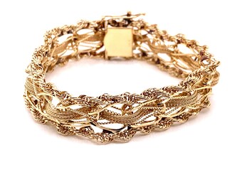 Vintage 1960’s 14k yellow gold charm bracelet