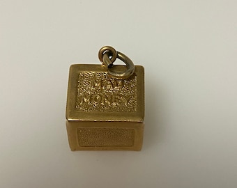 Vintage 14k yellow gold mad money, dollar charm