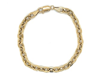 Könnte beinhalten: Ein goldenes Kettenarmband mit einem Karabinerverschluss.