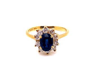 Vintage 1990’s 18k yellow gold oval sapphire and diamond halo ring