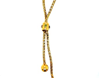 Collar vintage de lazo de oro amarillo de 14 quilates con piedras preciosas