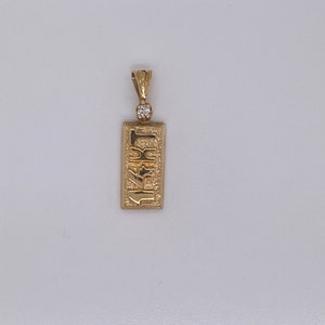 Vintage 14k yellow gold 14KT charm pendant with small diamond