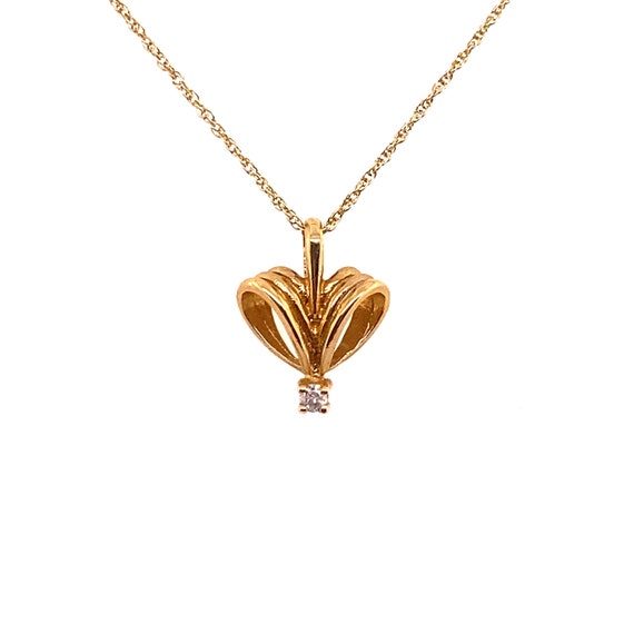 Vintage 14k yellow gold ribbon heart pendant with… - image 1