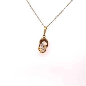 Vintage 14k yellow gold fancy charm pendant with small diamond