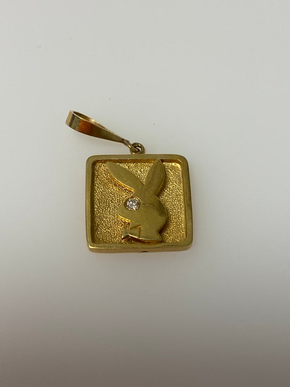 Vintage 14k yellow gold playboy bunny, playboy log