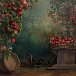 May include: A rustic wooden table with a basket of red apples, surrounded by green foliage and a wooden barrel. The background features a painted mural of a tree with red apples.