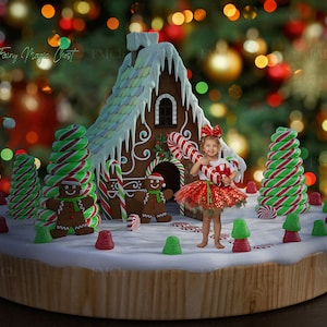 May include: A gingerbread house with candy cane accents sits on a wooden base covered in snow.  A child in a red and white dress holds a candy cane and stands in front of the house.  The scene is surrounded by candy cane trees and gumdrops.