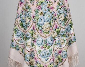 May include: A pink floral patterned shawl with a white fringe. The shawl features a traditional Russian design with a central floral motif and a repeating border of flowers and leaves.