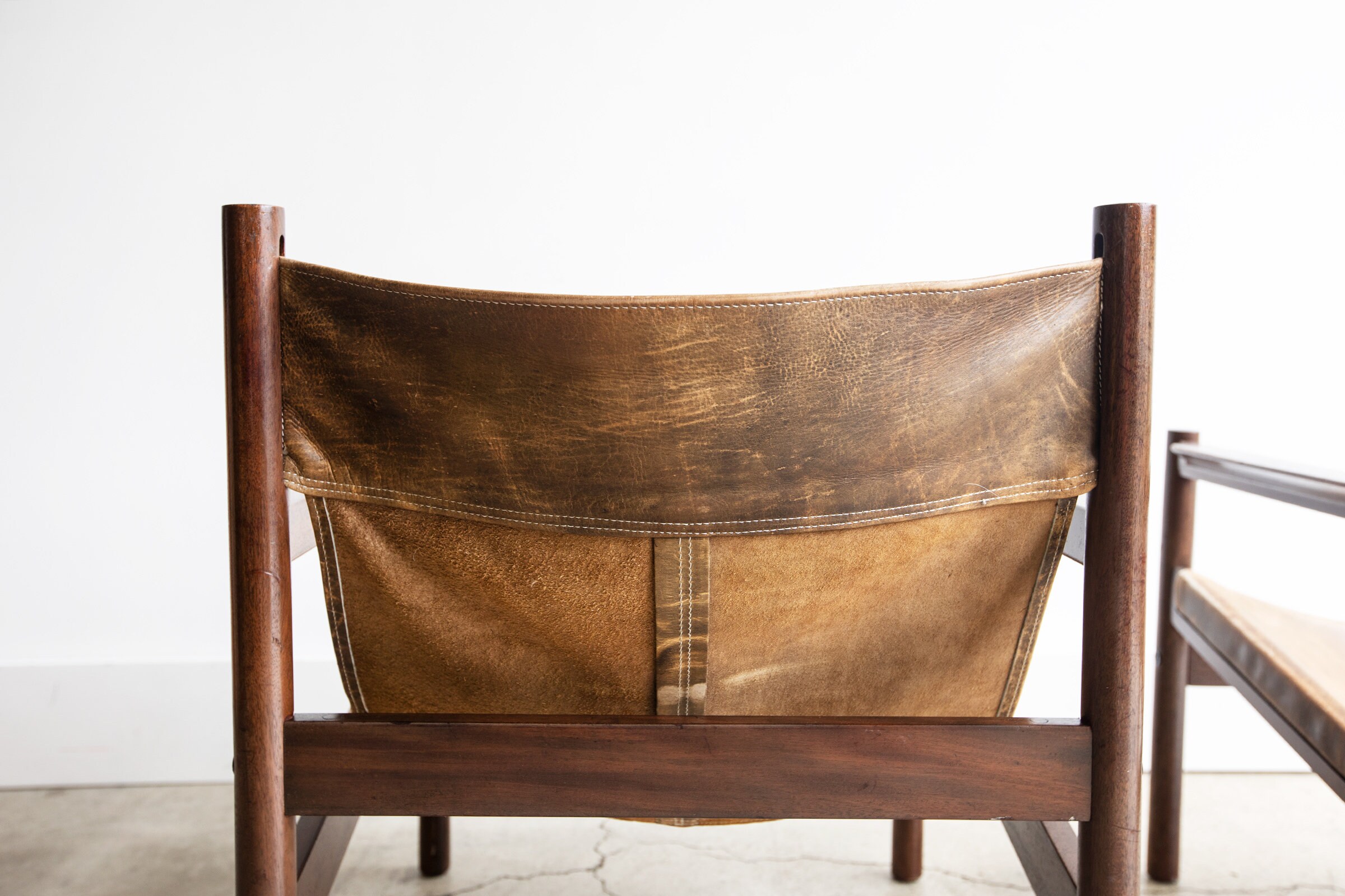 Faux leather sling chair online