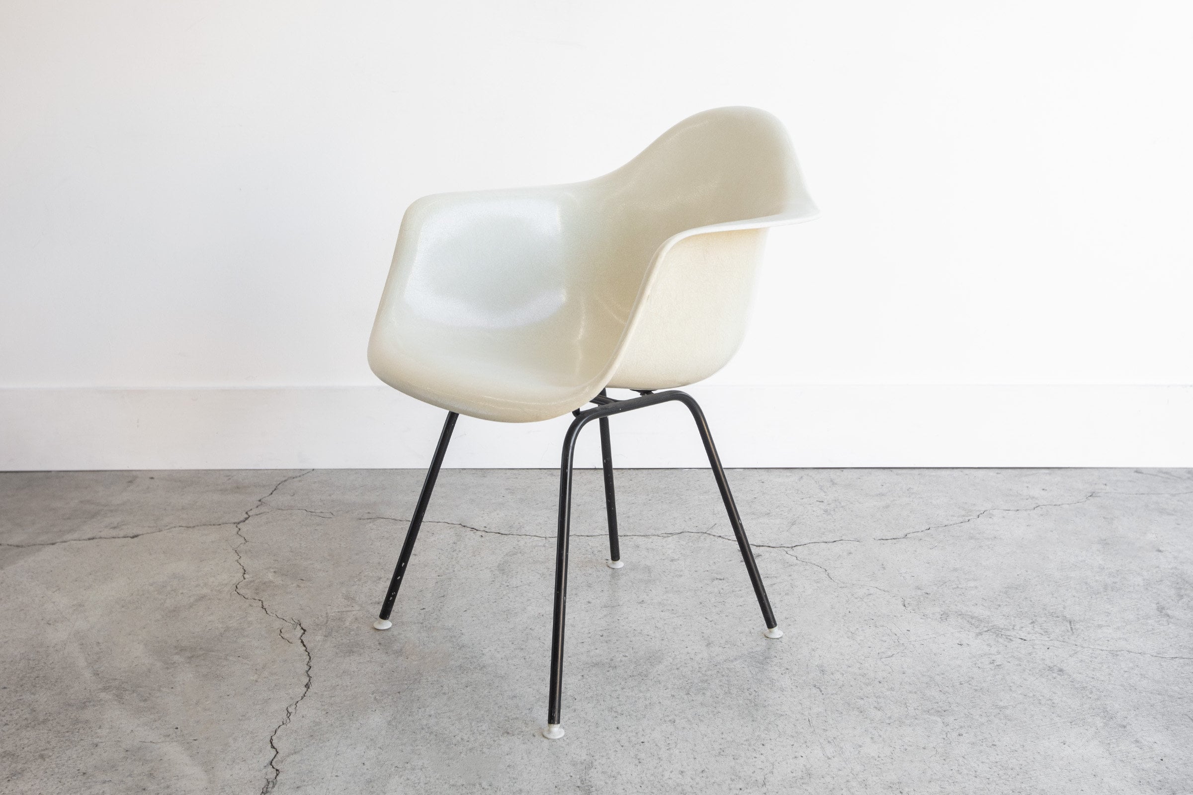 SOLD | 1950s Vintage Eames for Herman Miller DAH Fiberglass Arm Shell Chair in a Parchment Cream - circa 1950s
