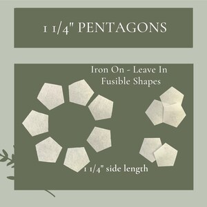 May include: A set of 1 1/4 inch iron-on fusible pentagon shapes. The pentagons are white and are arranged in a circle on a green background. The text "1 1/4" PENTAGONS" is at the top of the image. The text "Iron On - Leave In Fusible Shapes" is in the middle of the image. The text "1 1/4" side length" is at the bottom of the image.