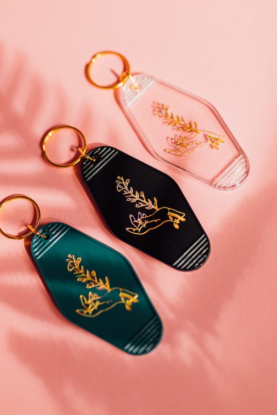 Hand and flower holographic gold motel keychain | holographic gold printed design | key accessories