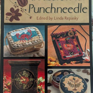 May include: A book titled a Passion for Punchneedle edited by Linda Repasky. The cover features four images: a woven basket with a crab design, a black bag with a pumpkin motif, a dark clock face with floral details, and a round pincushion.