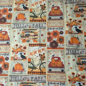 May include: A fabric panel featuring a fall theme with pumpkins, sunflowers, and crows. The design includes a red truck filled with pumpkins, a bicycle with a basket, and a camper. Text includes "Hello Fall", "Welcome", and "Happy Fall Y'all".