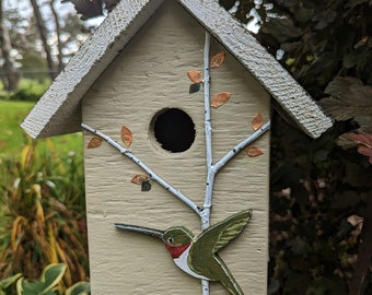 Handmade wood birdhouse, light tan and black stained roof. Handcut and painted hummingbird, branches and leaves. Fast shipping!