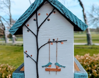 Handmade wood birdfeeder painted with exterior paint. Would be appreciated as a gift! Fast shipping!