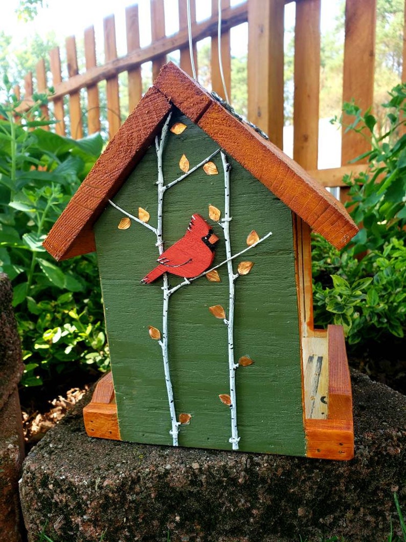 Beautiful handmade wood bird feeder, painted hunter green, or navy and a stained cedar color roof with hand painted accents. image 3