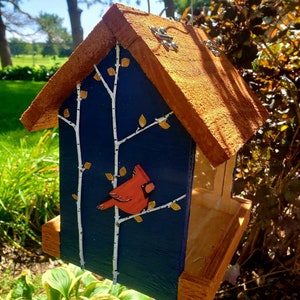 Beautiful handmade wood bird feeder, painted hunter green, or navy and a stained cedar color roof with hand painted accents. image 5