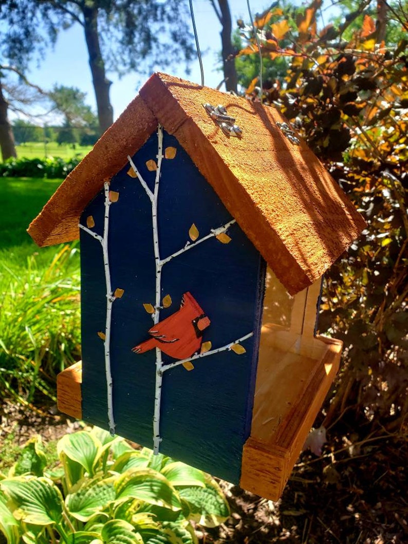 Beautiful handmade wood bird feeder, painted hunter green, or navy and a stained cedar color roof with hand painted accents. image 5