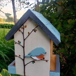 Colorful handmade wood bird feeder. Easy open roof! Featuring hand painted bluebirds. Fast shipping!