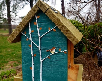 Handmade wood birdfeeder painted with exterior paint. Would be appreciated as a gift! Fast shipping!