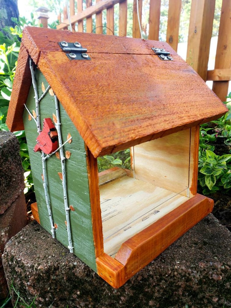 Beautiful handmade wood bird feeder, painted hunter green, or navy and a stained cedar color roof with hand painted accents. image 4