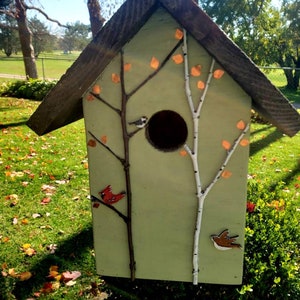 Handmade birdhouse, decorated with copper leaves, tree branches, and handpainted birds. One of a kind!