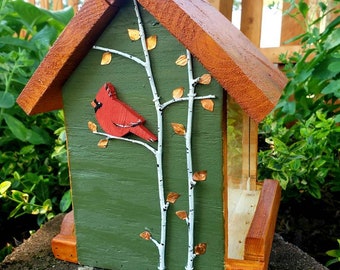 Beautiful handmade wood bird feeder, painted hunter green, or navy and a stained cedar color roof with hand painted accents.